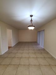 1547 LAKE CRYSTAL Drive A, West Palm Beach, FL 33411