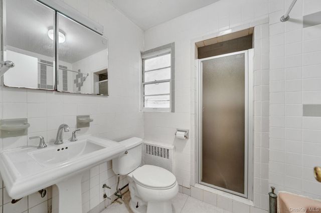 62-08 102nd Street, Rego Park, NY 11374