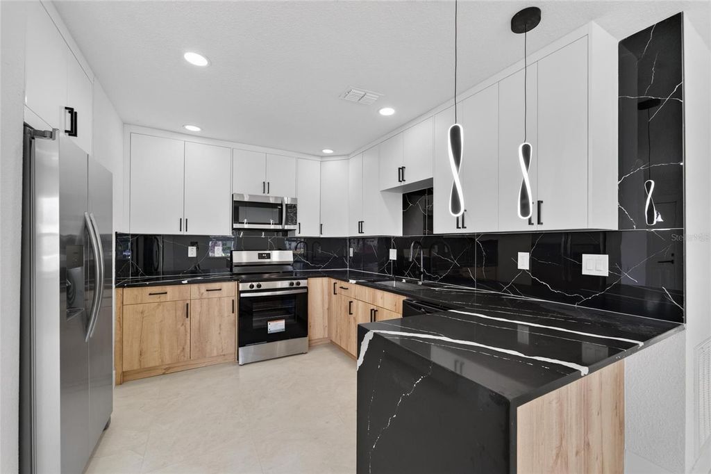 Image 16 of property listing at 4711 W LAWN AVENUE, Tampa, FL 33611