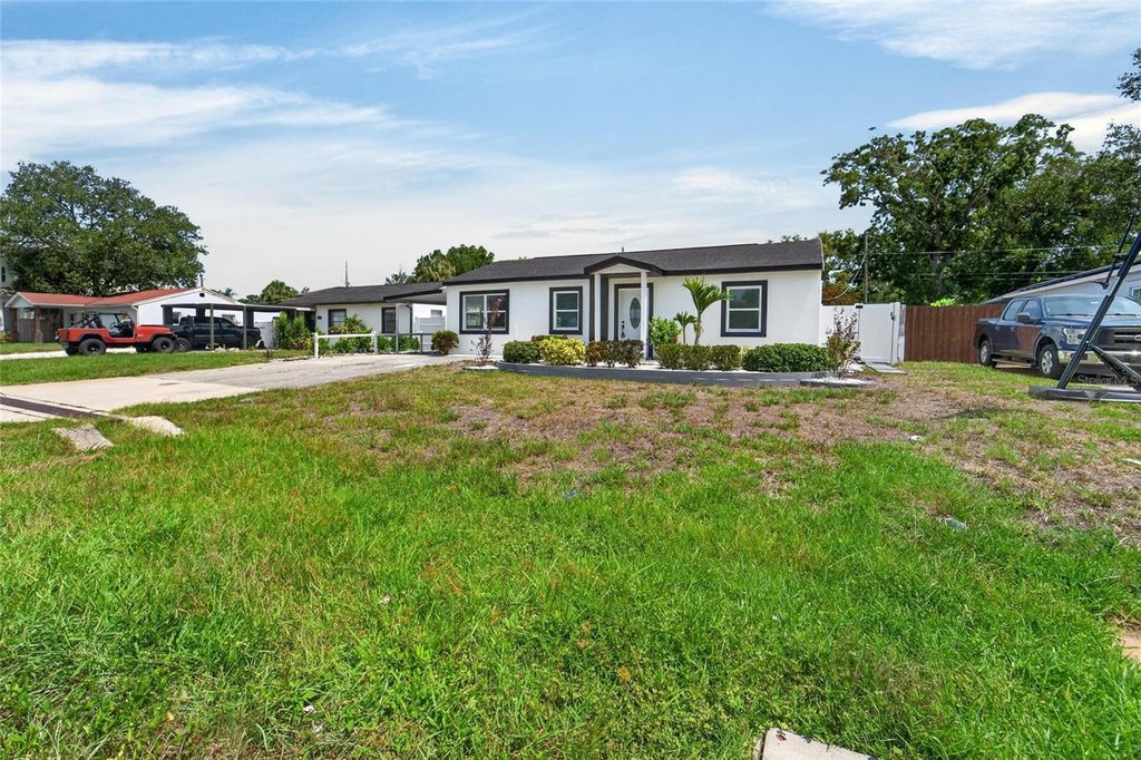 Image 3 of property listing at 4711 W LAWN AVENUE, Tampa, FL 33611