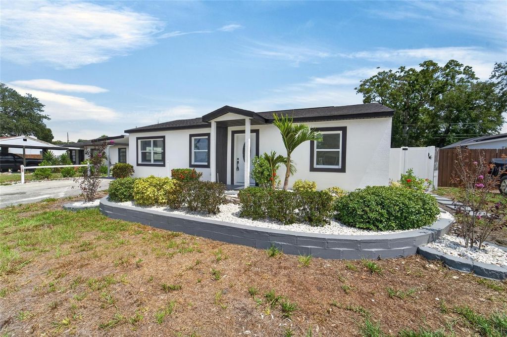 Image 5 of property listing at 4711 W LAWN AVENUE, Tampa, FL 33611