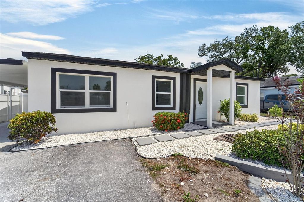 Image 8 of property listing at 4711 W LAWN AVENUE, Tampa, FL 33611