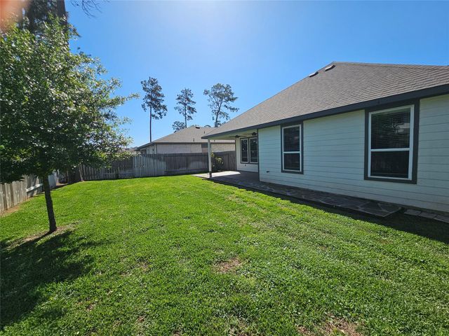 10026 Angelina Woods Lane, Conroe, TX 77384