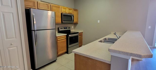 8227 LOBSTER BAY Court, 203, Jacksonville, FL 32256