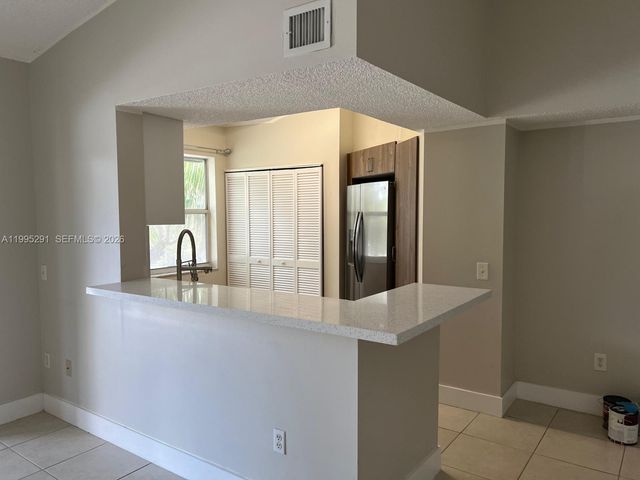 9645 NW 1st Ct 1-209, Pembroke Pines, FL 33024