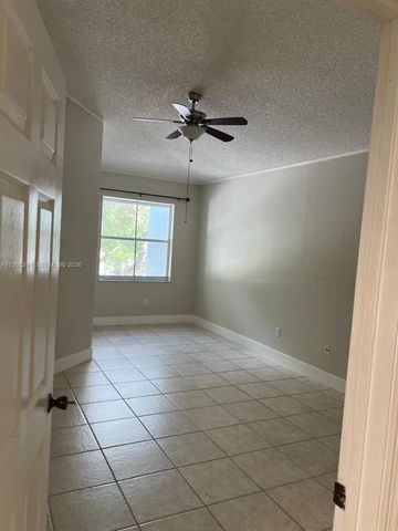 9645 NW 1st Ct 1-209, Pembroke Pines, FL 33024