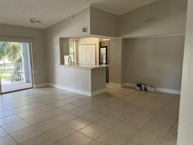 9645 NW 1st Ct 1-209, Pembroke Pines, FL 33024