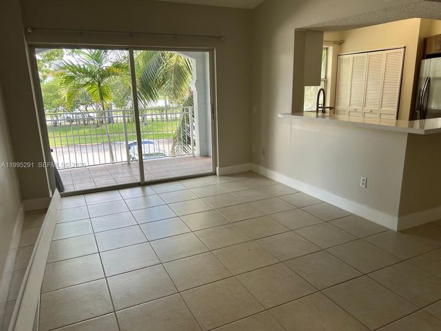 9645 NW 1st Ct 1-209, Pembroke Pines, FL 33024