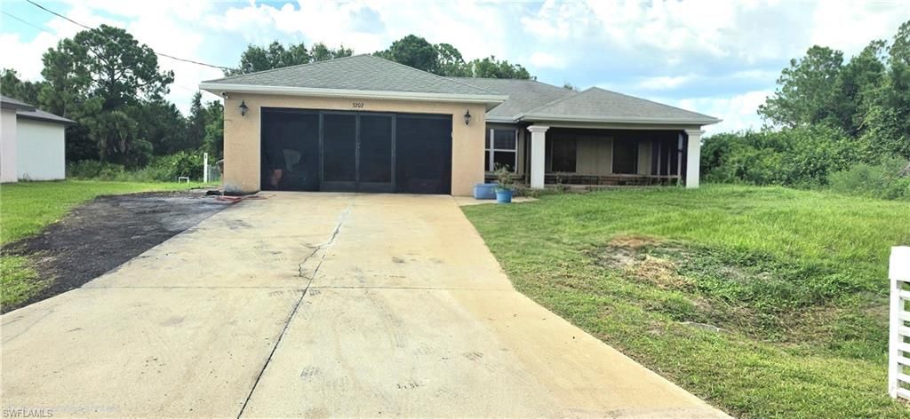 3202 54th ST W, LEHIGH ACRES, FL 33971 — exterior