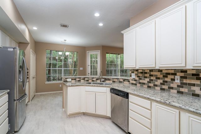 66 Lakeridge Court, The Woodlands, TX 77381