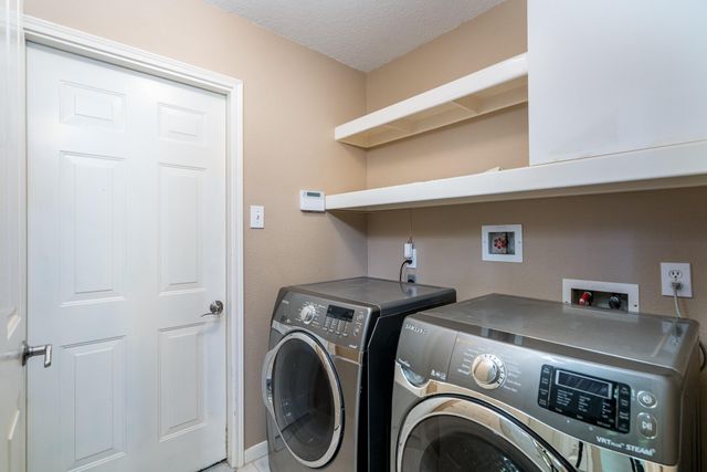 66 Lakeridge Court, The Woodlands, TX 77381