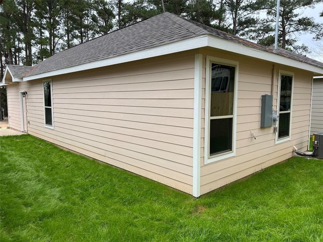 11595 Persimmon Street, Willis, TX 77318