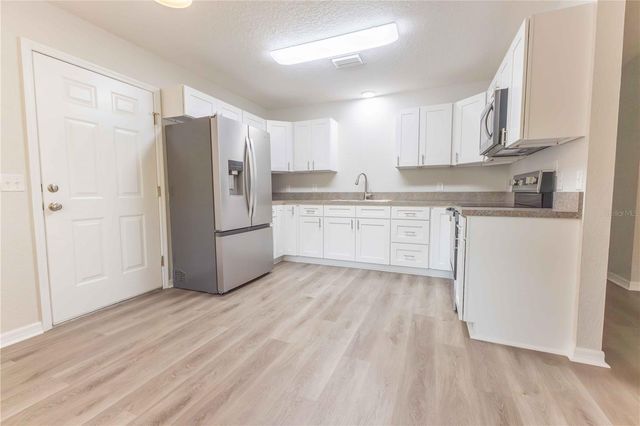 4438 CALAMONDIN STREET, Lady Lake, FL 32159