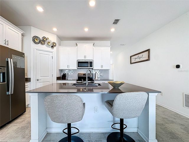 6952 DILLY LAKE AVENUE, Groveland, FL 34736