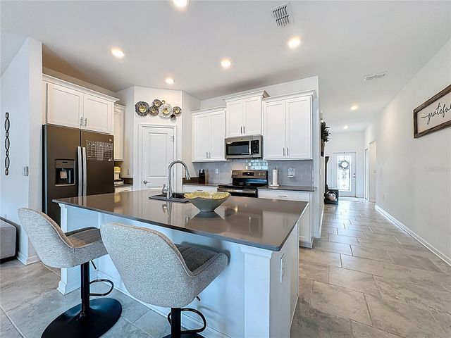 6952 DILLY LAKE AVENUE, Groveland, FL 34736