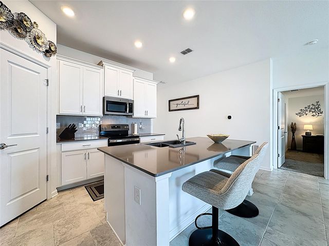 6952 DILLY LAKE AVENUE, Groveland, FL 34736