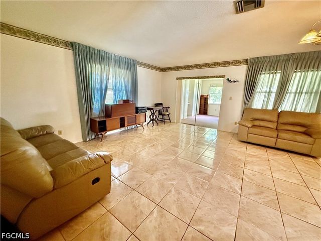 217 Oaklawn CT, Lehigh Acres, FL 33936
