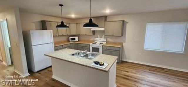 802 E Jasmine RD, Lehigh Acres, FL 33936