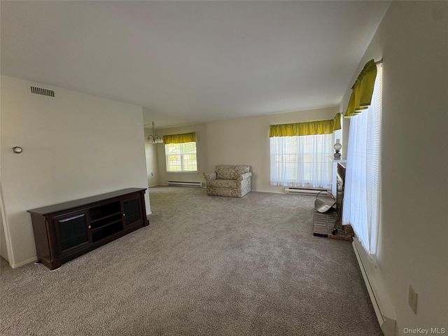 491 Stratford Lane, Ridge, NY 11961