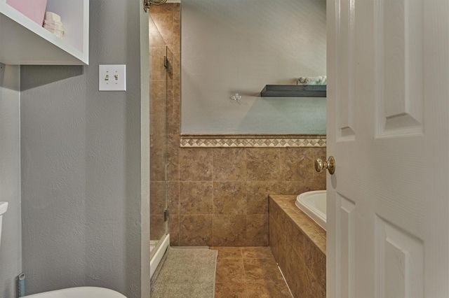 100 W Rainbow Ridge Circle, The Woodlands, TX 77381