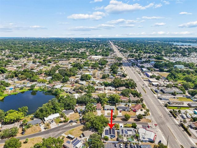 10748 VILLAGE GREEN AVE, Seminole, FL 33772