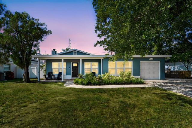 10748 VILLAGE GREEN AVE, Seminole, FL 33772