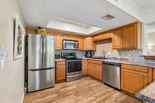 10748 VILLAGE GREEN AVE, Seminole, FL 33772