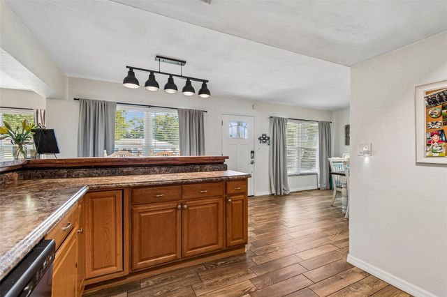 10748 VILLAGE GREEN AVE, Seminole, FL 33772