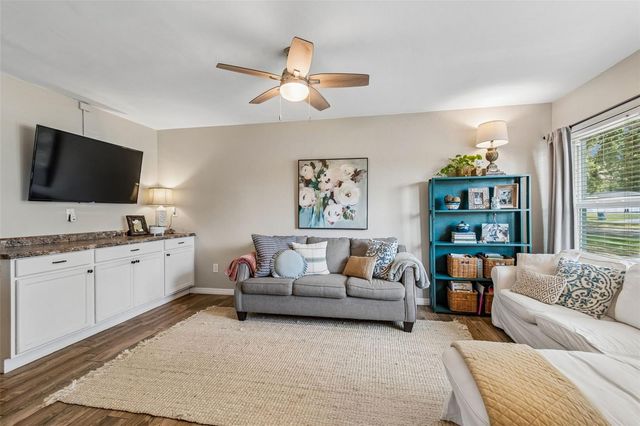 10748 VILLAGE GREEN AVE, Seminole, FL 33772