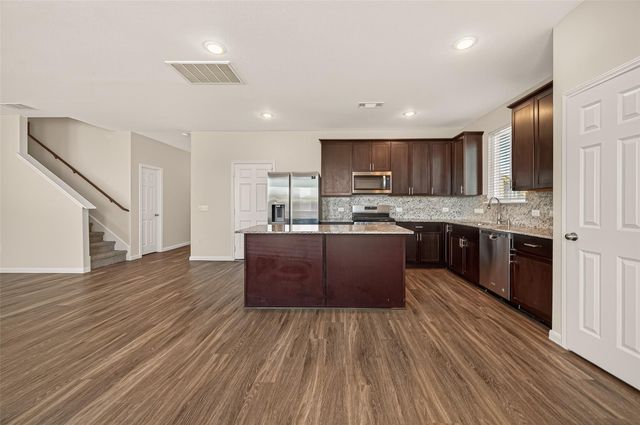 7202 Hobby Wind Ridge Drive, Houston, TX 77075