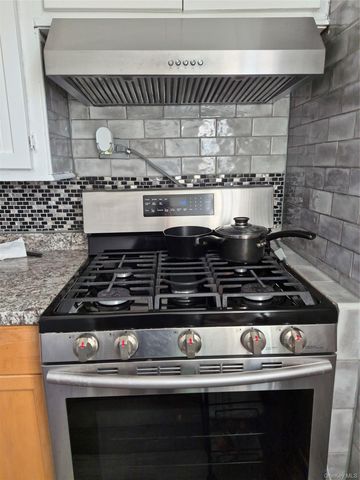 105-52 88th Street, Ozone Park, NY 11417