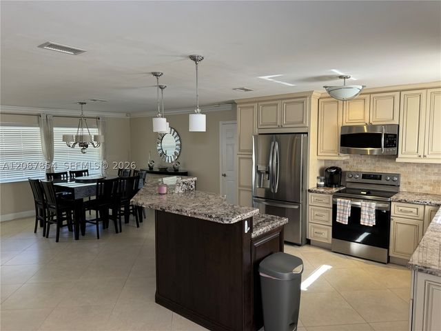 2448 Holly Ln ., Palm Beach Gardens, FL 33410