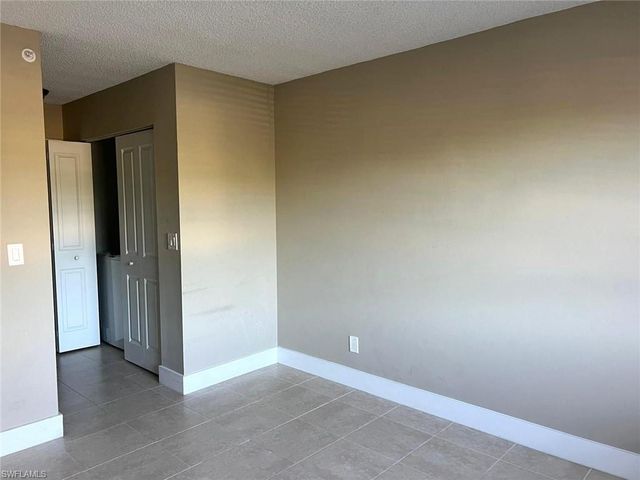1205 Wildwood Lakes BLVD 203, Naples, FL 34104