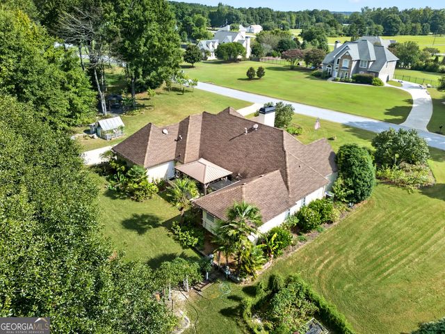 52 Braves Crossing Court, Sharpsburg, GA 30277