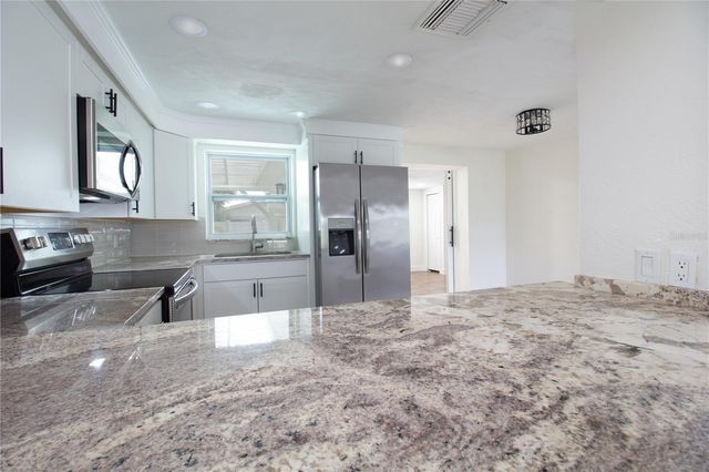 1408 JENNINGS DRIVE, Holiday, FL 34690