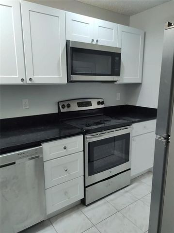 1022 Twin Lakes Drive, Coral Springs, FL 33071