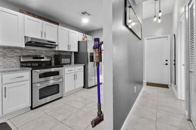 4169 S Pine Island Rd, Davie, FL 33328