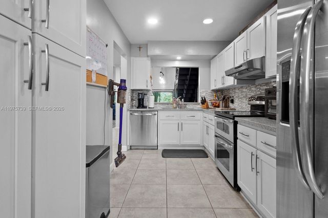 4169 S Pine Island Rd, Davie, FL 33328