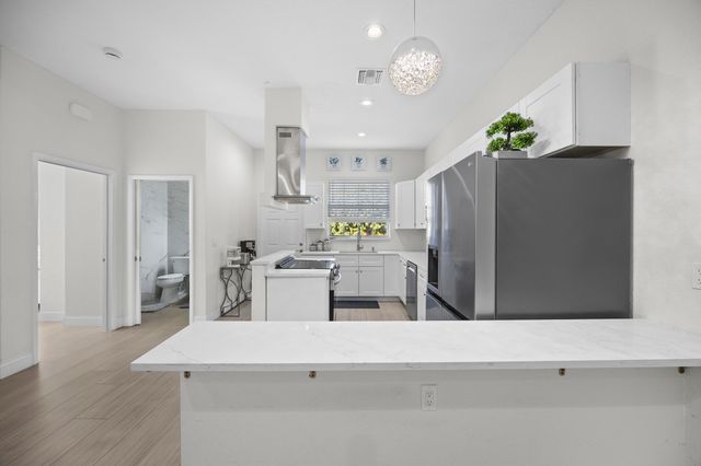 6934 Grapeview Boulevard, The Acreage, FL 33470