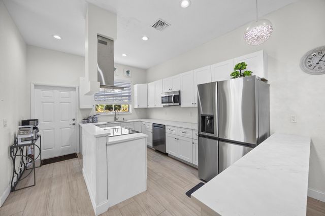 6934 Grapeview Boulevard, The Acreage, FL 33470