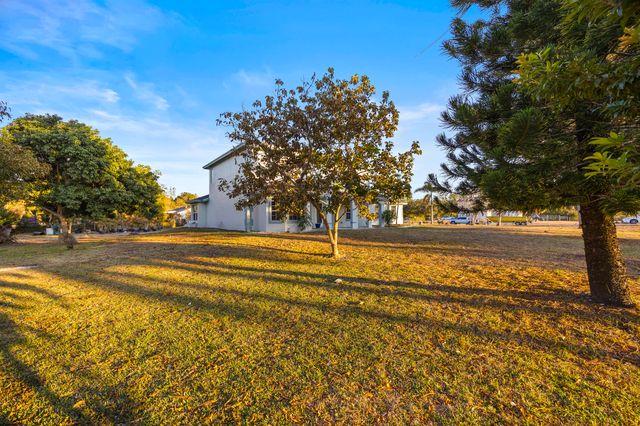 6934 Grapeview Boulevard, The Acreage, FL 33470