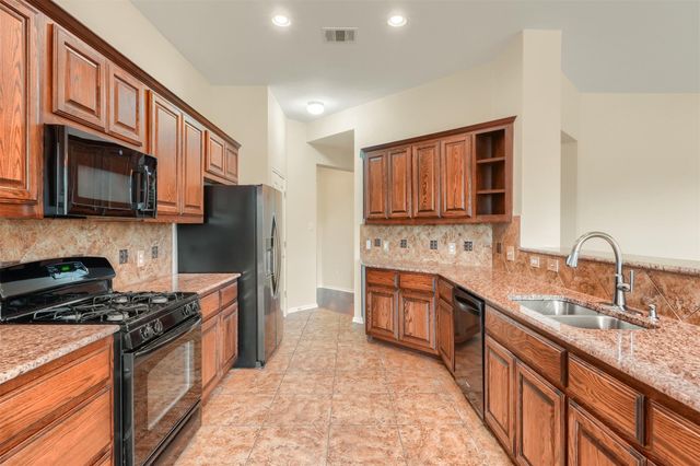 318 Blossom Valley STRM, Buda, TX 78610