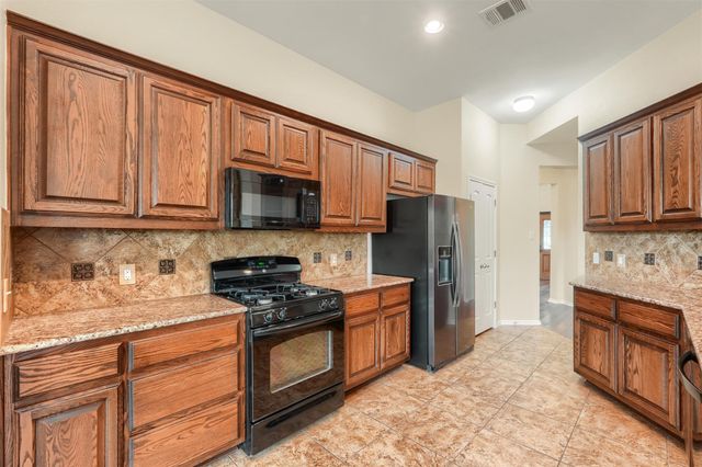 318 Blossom Valley STRM, Buda, TX 78610