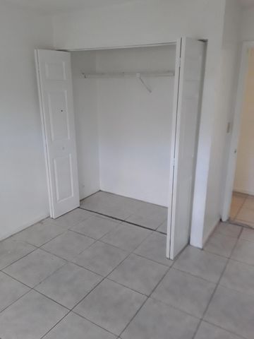7662 Kimberly Boulevard 1-3, North Lauderdale, FL 33068
