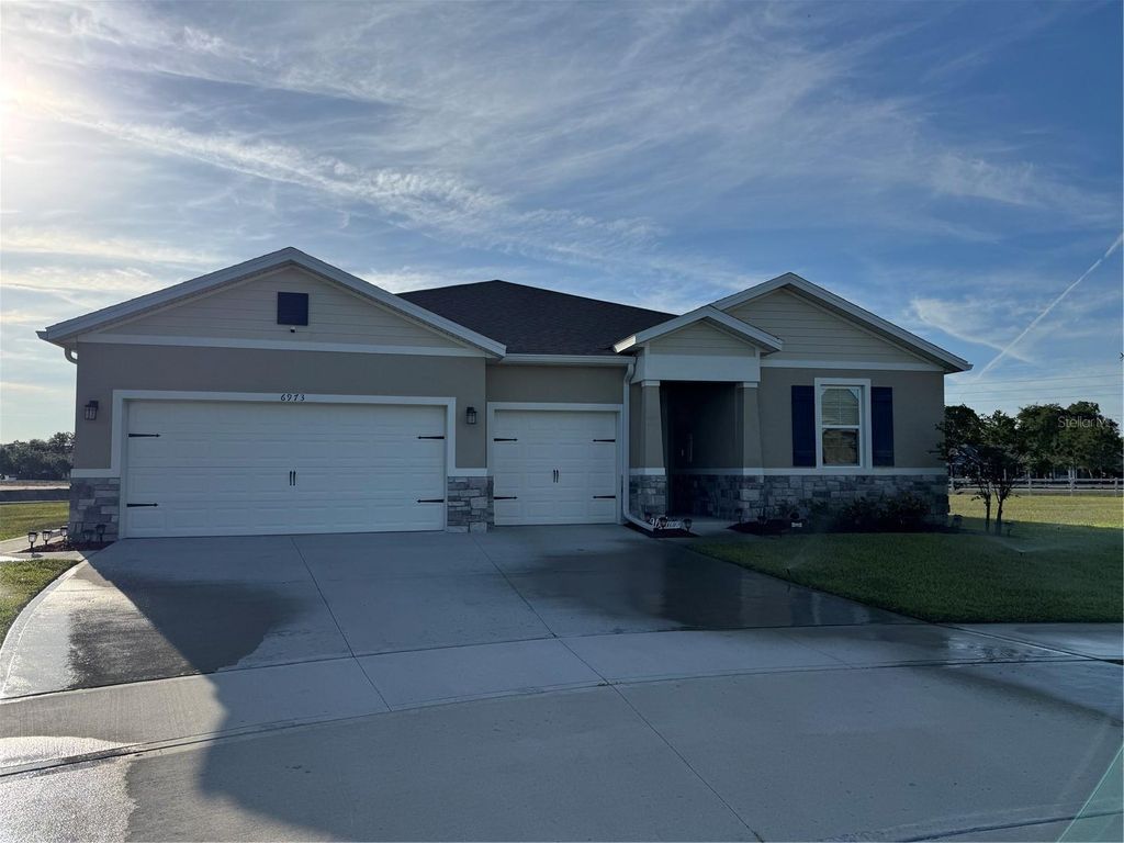 6973 AUDOBON OSPREY COVE, Harmony, FL 34773