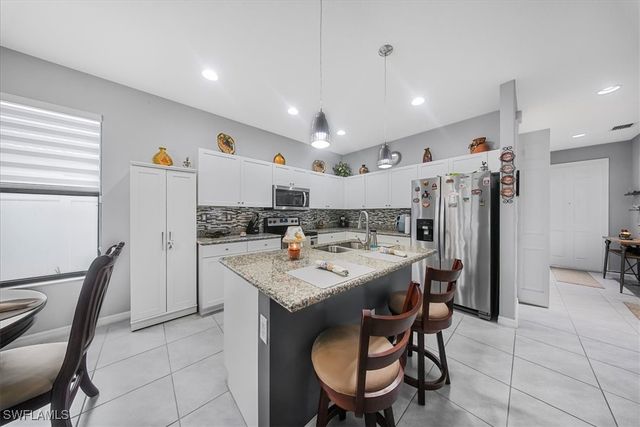 8805 Madrid CIR, Naples, FL 34104