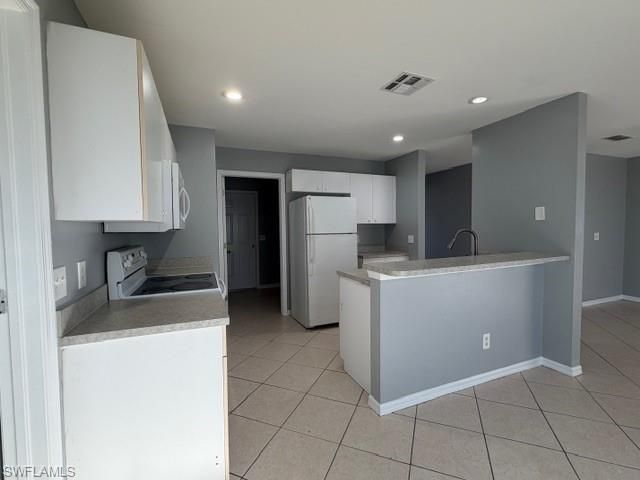 1242 Ermine ST E, Lehigh Acres, FL 33974