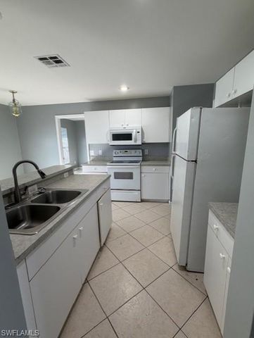 1242 Ermine ST E, Lehigh Acres, FL 33974