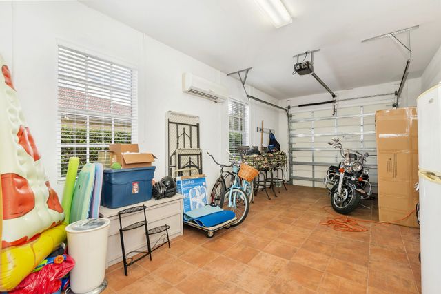 594 N Country Club Drive, Atlantis, FL 33462