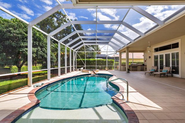 594 N Country Club Drive, Atlantis, FL 33462